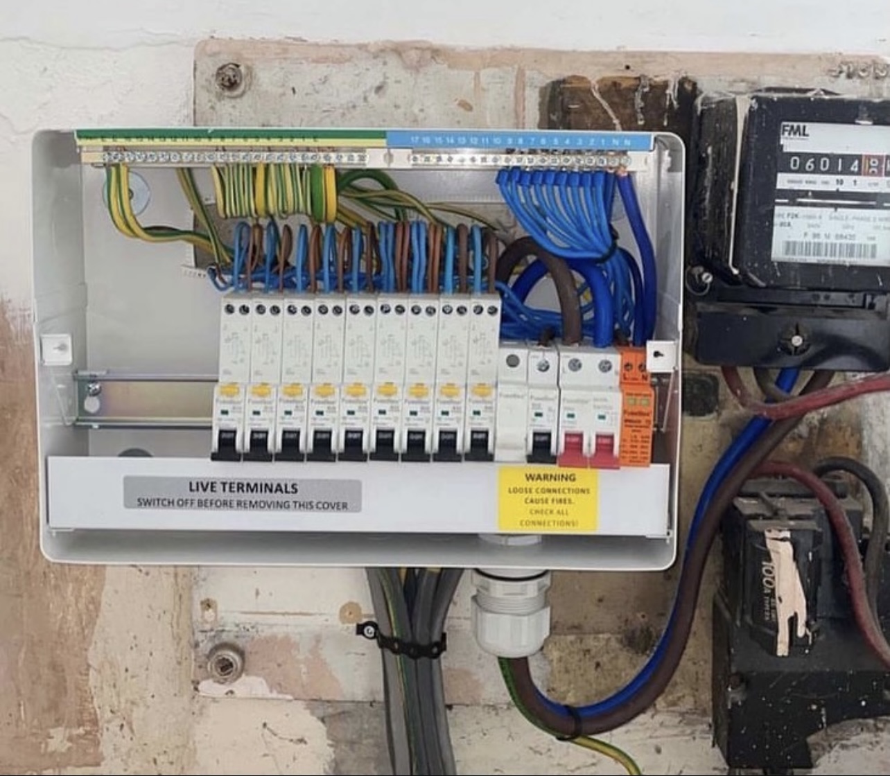 Schneider consumer unit upgrade replacing old fuse board in Surrey